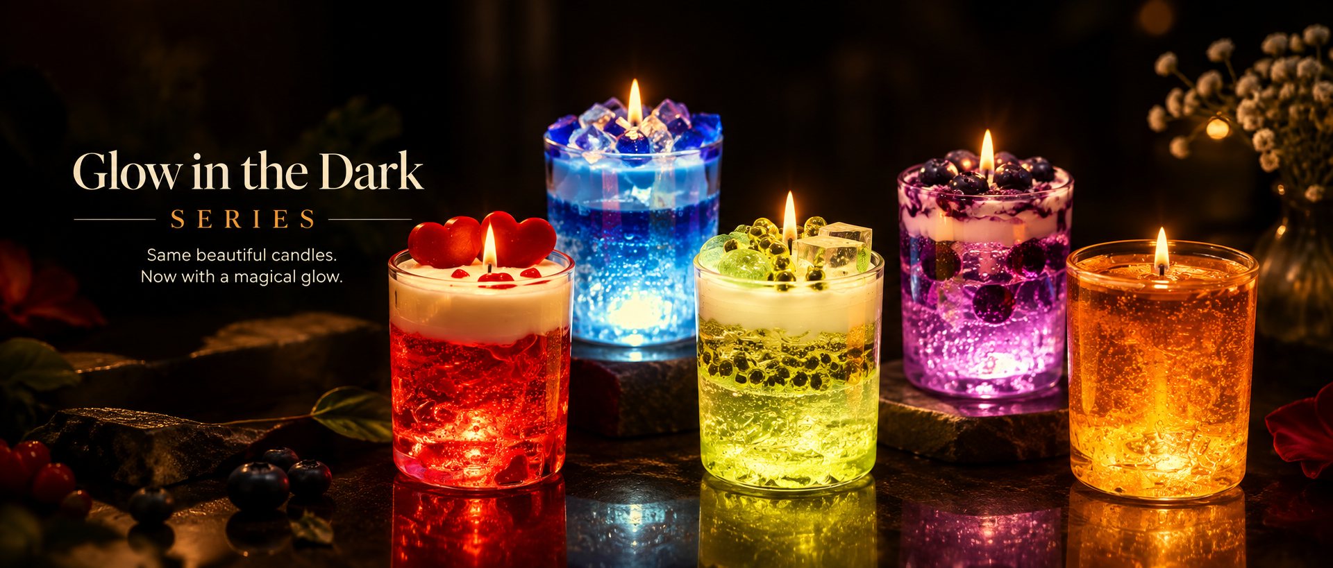Glow in the Dark Series: five Pairsense gel candles lit from within, in red, blue, green, violet and amber
