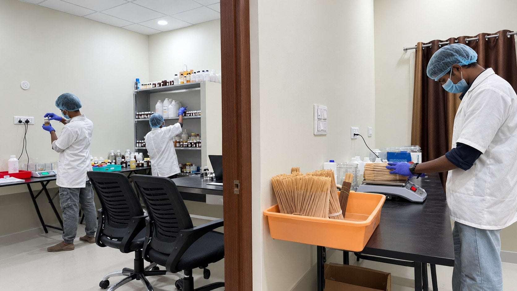 Pairsense perfumers weighing and blending accords in the company's own lab